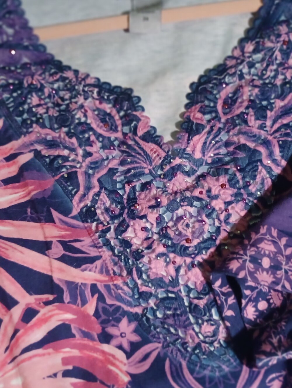 Floral /botanical Top with Pink & Purple Print. Lightly Beaded Around Neckline.